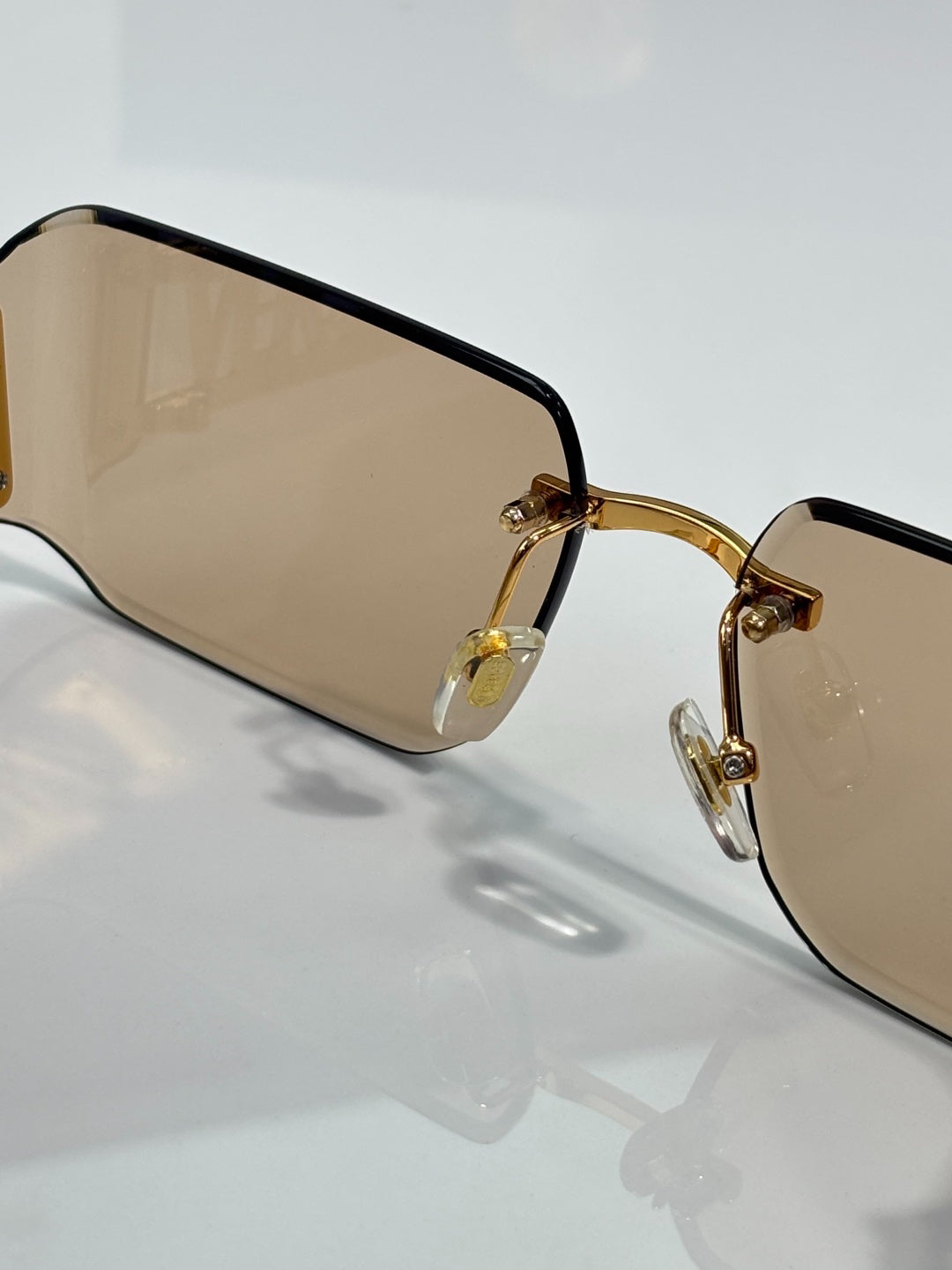 Versace Gold-Tone Rimless Sunglasses with Light Brown Lenses & Medusa Logo Temples