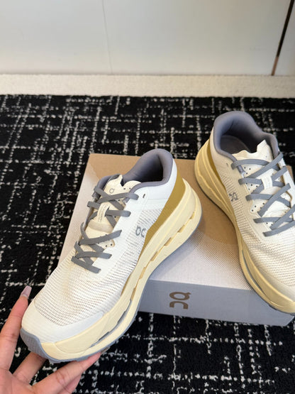 On Cloudmonster Unisex Road Running Sneakers Cream Off White Gold Band Beige Midsole Thick CloudTec Sport Shoes