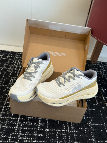 On Cloudmonster Unisex Road Running Sneakers Cream Off White Gold Band Beige Midsole Thick CloudTec Sport Shoes