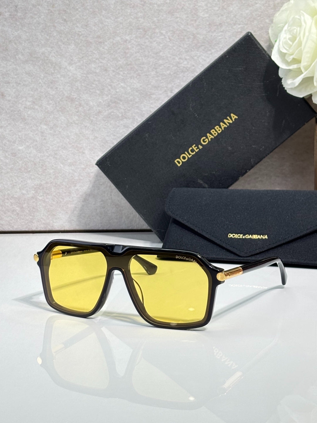 Dolce & Gabbana Black Aviator Sunglasses with Yellow Lenses & Gold Accents