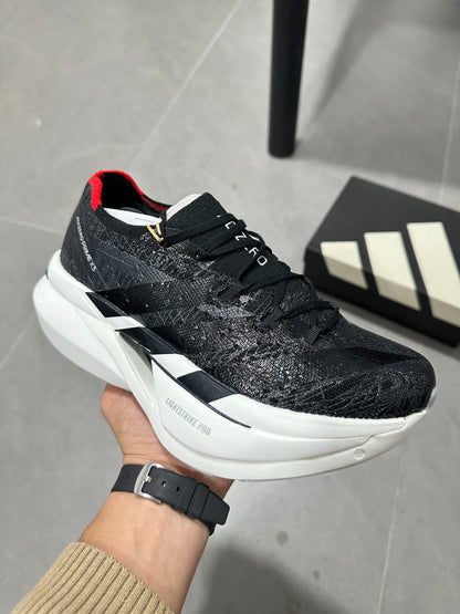 Adidas ADIZERO ADIOS PRO 4 (Core Black / Cloud White / Solar Red colorway)