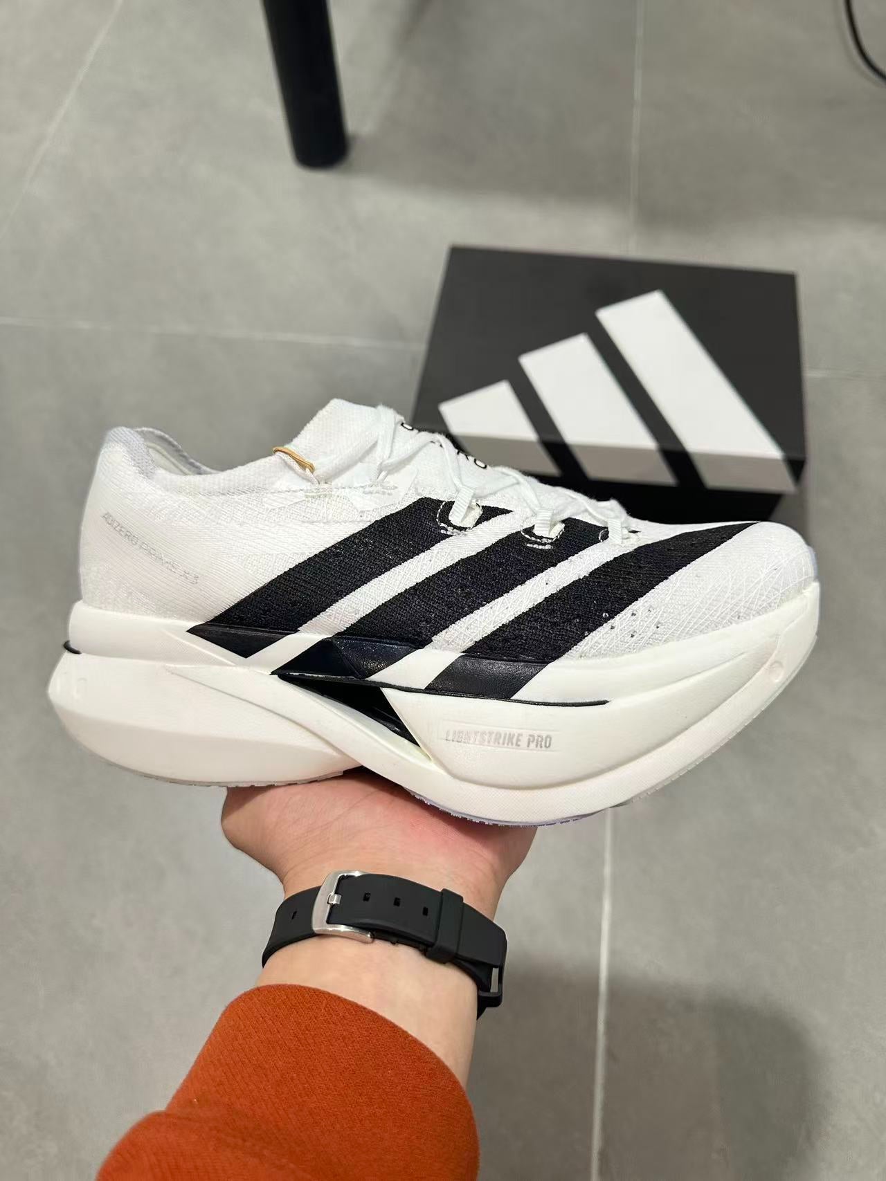 Adidas ADIZERO EVO SL (Cloud White / Core Black colorway