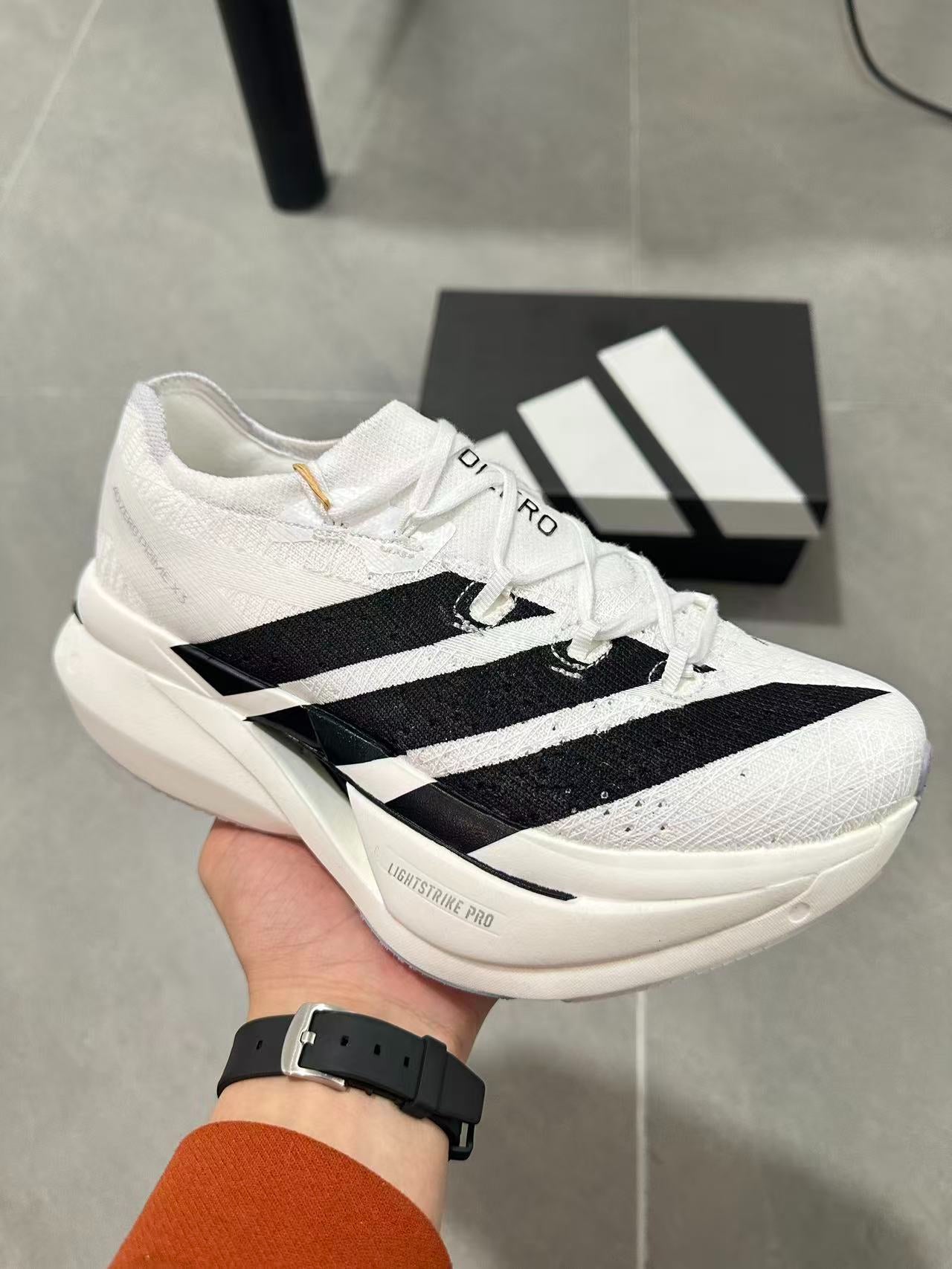 Adidas ADIZERO EVO SL (Cloud White / Core Black colorway