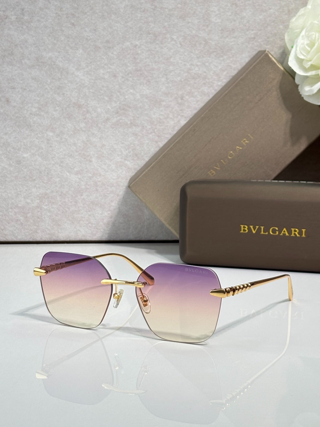 BVLGARI Gold-Tone Rimless Sunglasses with Purple-Yellow Gradient Lenses & Serpenti-Inspired Temples