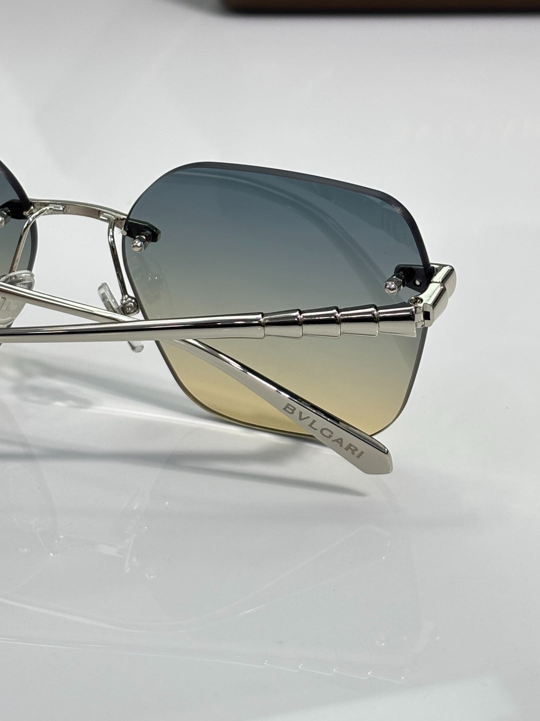 BVLGARI Gold-Tone Rimless Sunglasses with Purple-Yellow Gradient Lenses & Serpenti-Inspired Temples