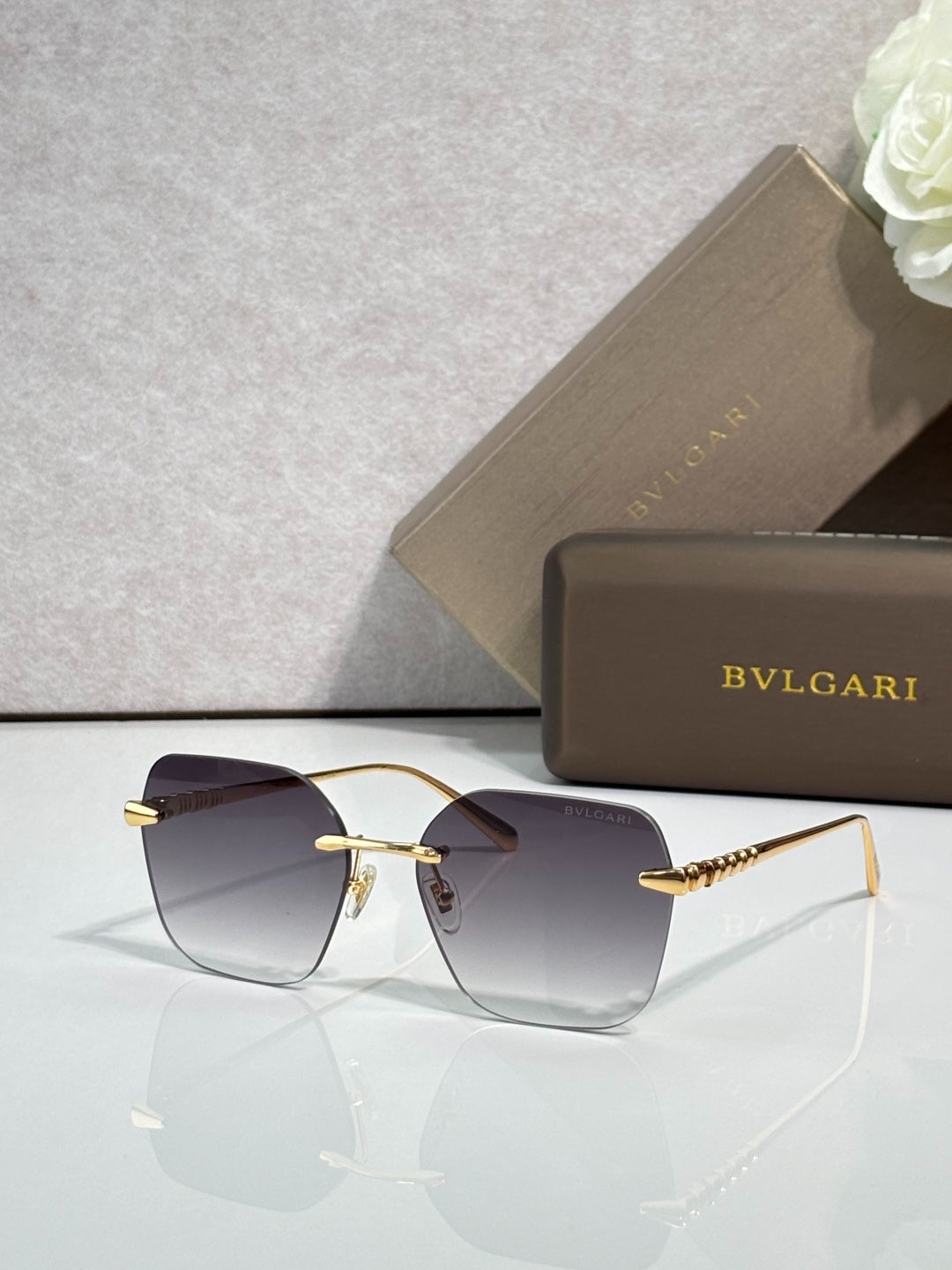 BVLGARI Gold-Tone Rimless Sunglasses with Purple-Yellow Gradient Lenses & Serpenti-Inspired Temples