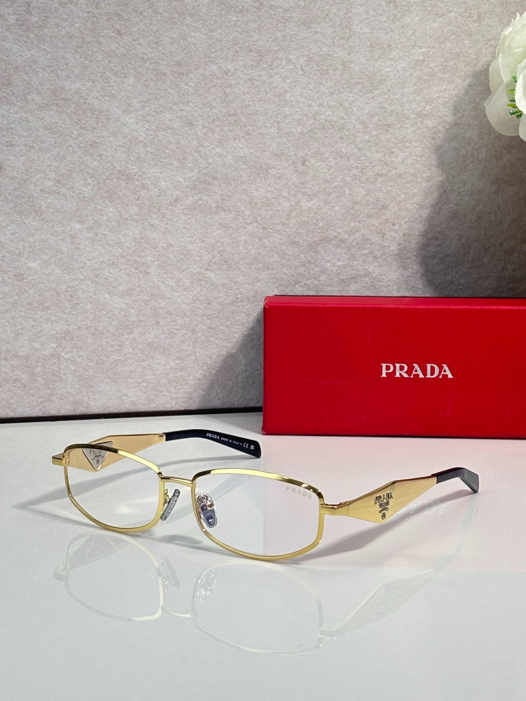 Prada Gold-Tone Metal Rectangular Sunglasses with Light Blue Lenses