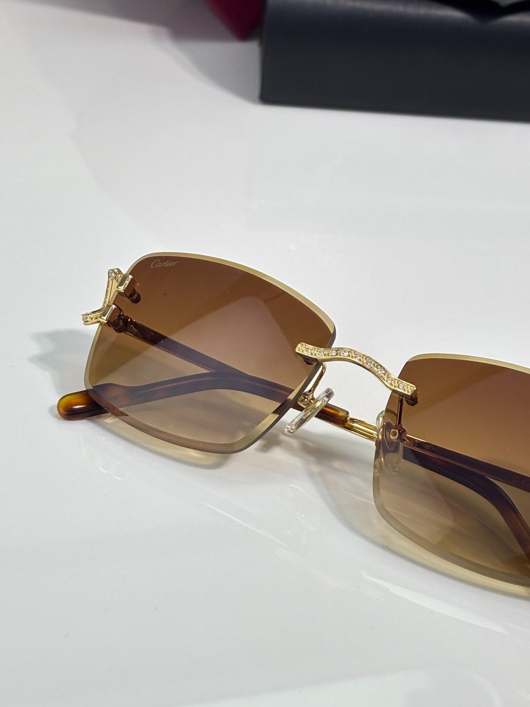 Cartier Gold-Tone Rimless Sunglasses with Gradient Brown Lenses & Diamond-Embellished Logo Temples