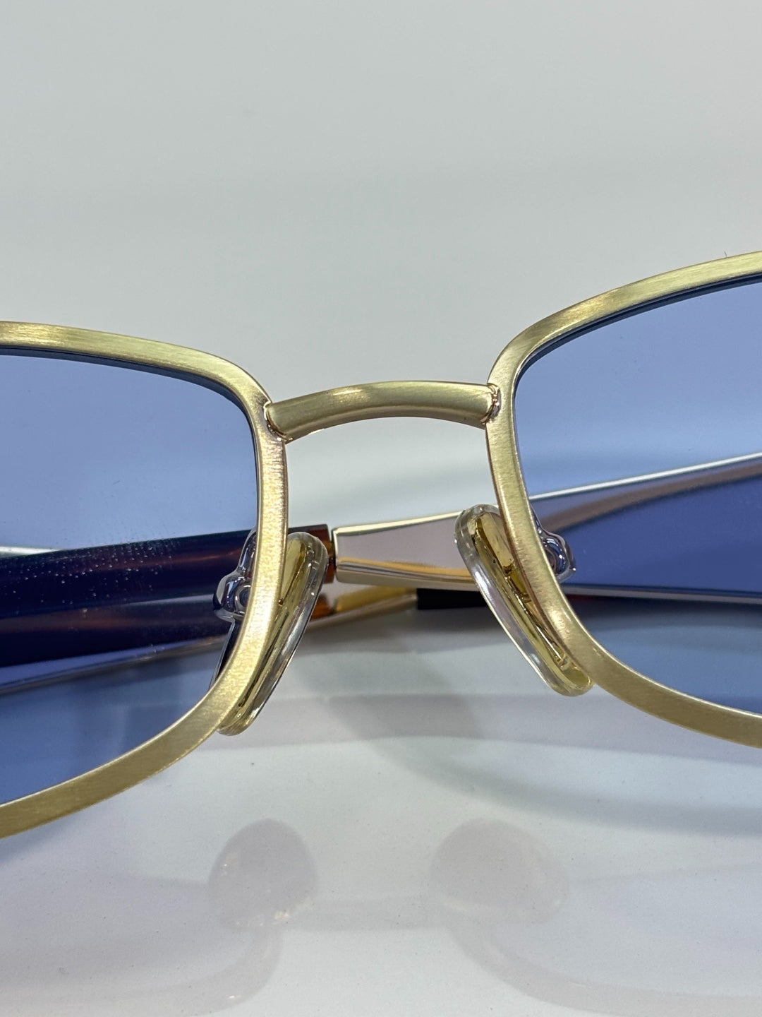 Prada Gold-Tone Metal Rectangular Sunglasses with Light Blue Lenses
