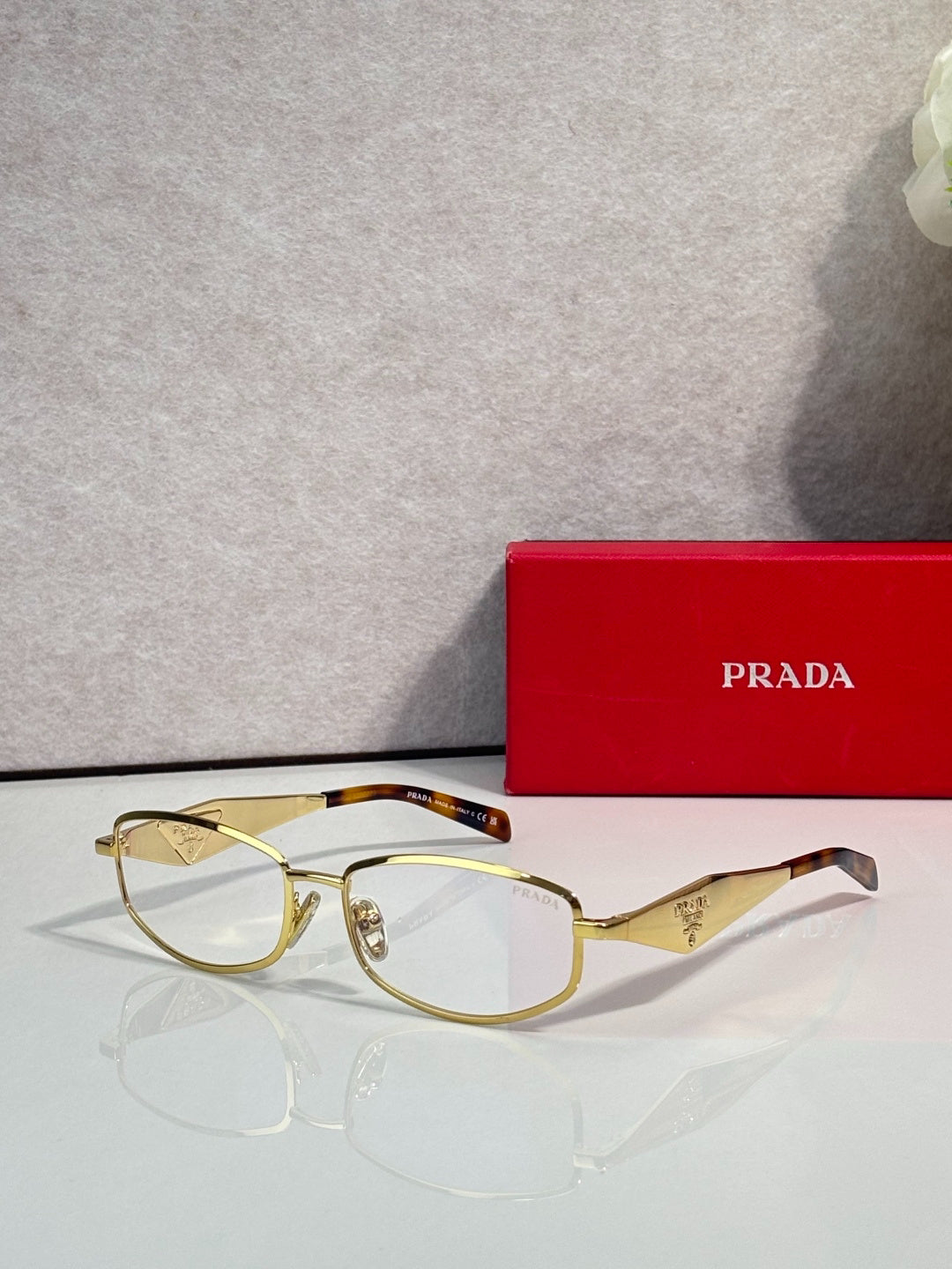 Prada Gold-Tone Metal Rectangular Sunglasses with Light Blue Lenses
