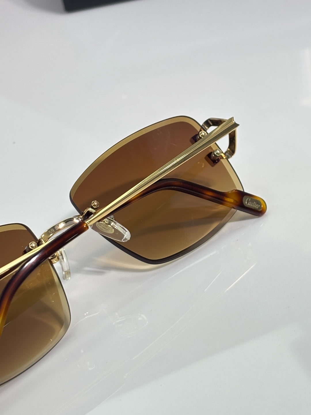 Cartier Gold-Tone Rimless Sunglasses with Gradient Brown Lenses & Diamond-Embellished Logo Temples
