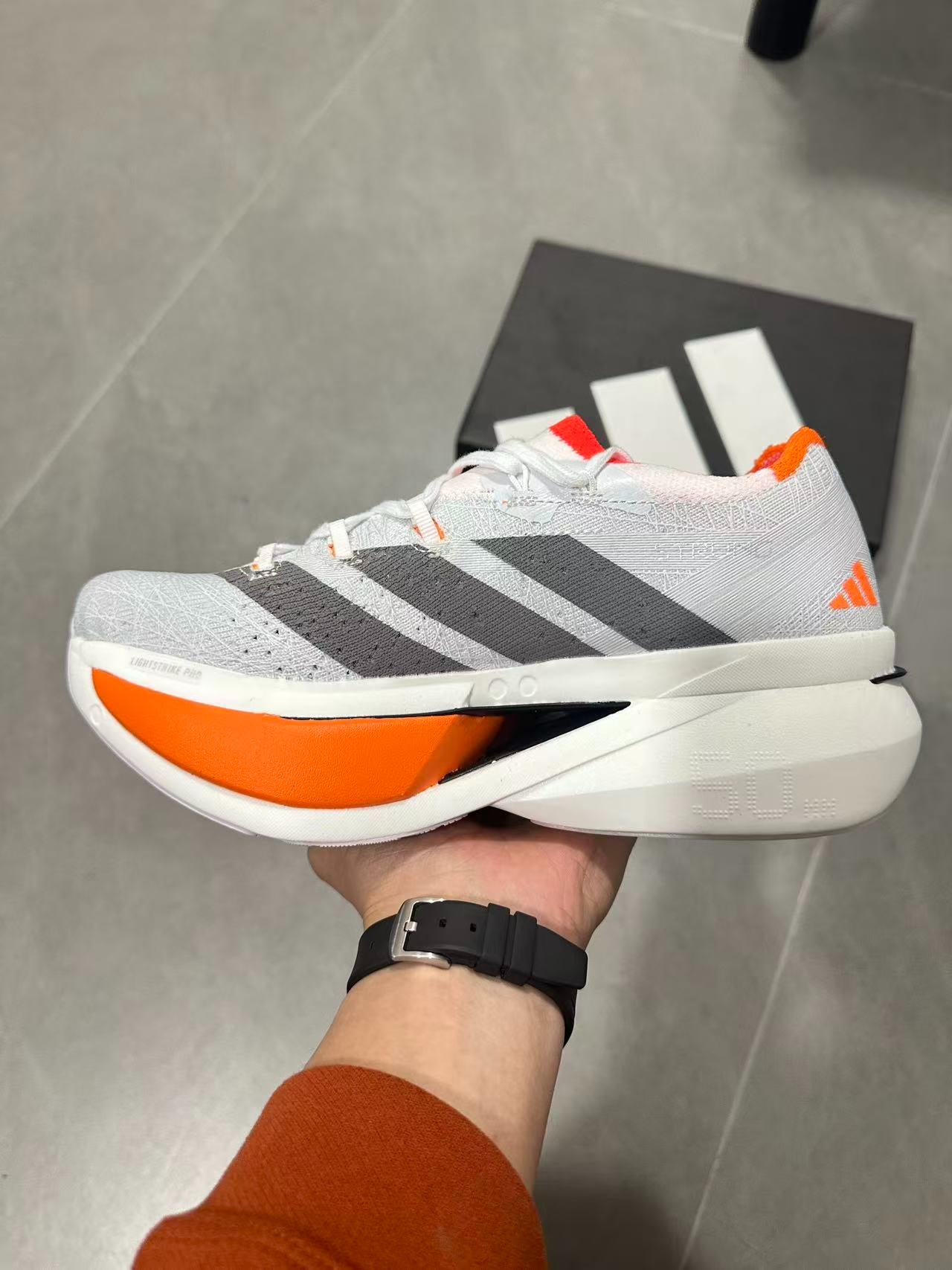 Adidas ADIZERO PRIME X3 STRUNG (Cloud White / Grey / Solar Red colorway)