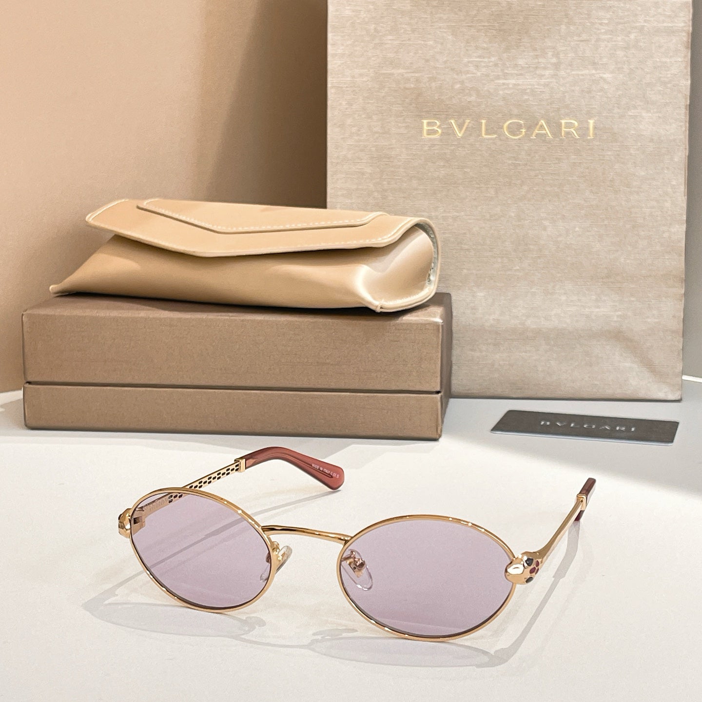 Bvlgari Serpenti Forever Luxury Oval Metal Sunglasses with Gold Frame and Gradient Grey Lenses