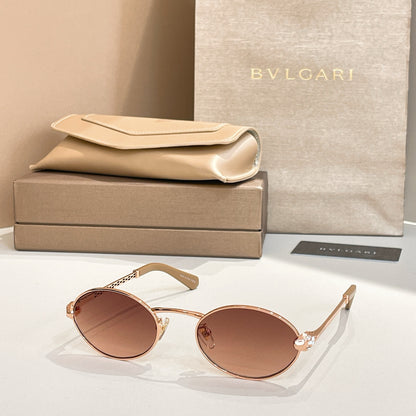 Bvlgari Serpenti Forever Luxury Oval Metal Sunglasses with Gold Frame and Gradient Grey Lenses