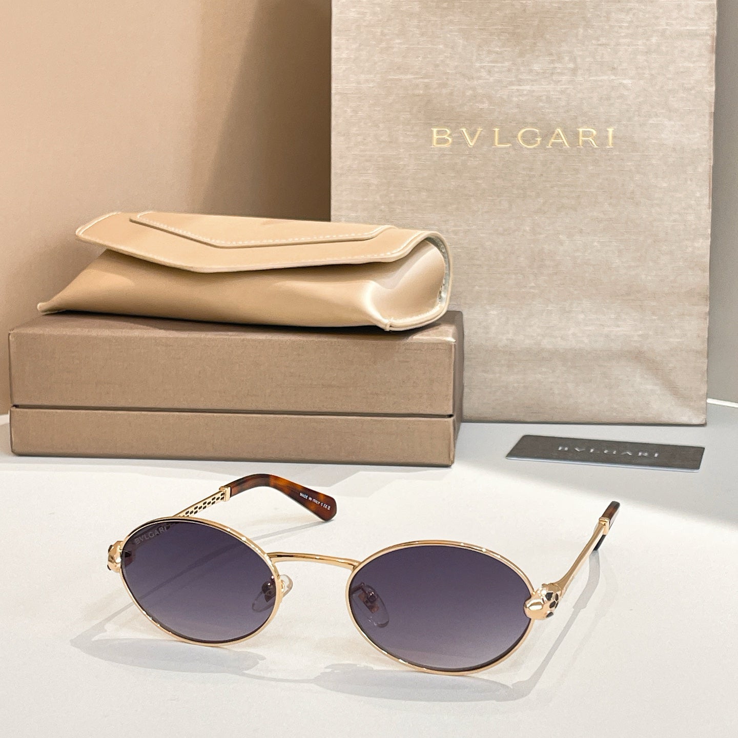 Bvlgari Serpenti Forever Luxury Oval Metal Sunglasses with Gold Frame and Gradient Grey Lenses