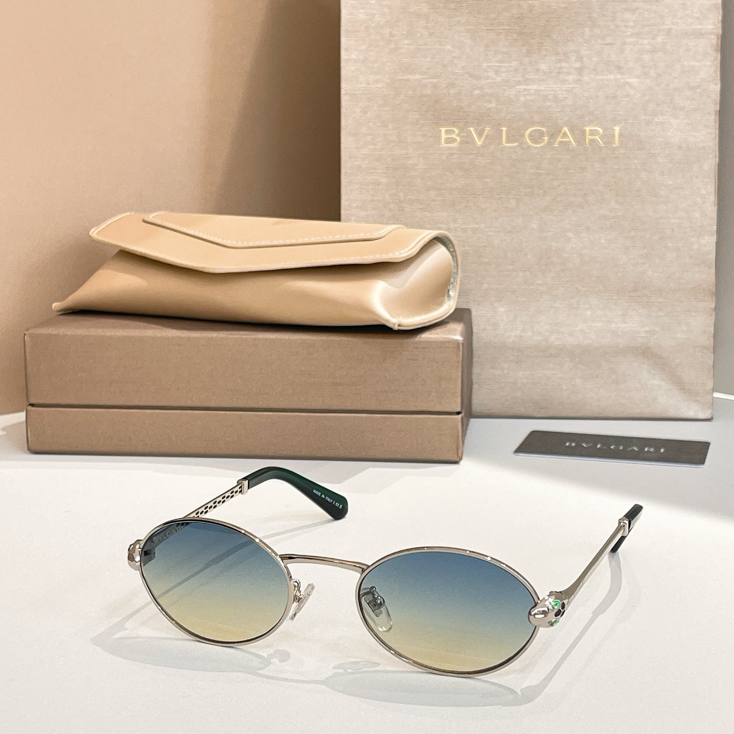 Bvlgari Serpenti Forever Luxury Oval Metal Sunglasses with Gold Frame and Gradient Grey Lenses
