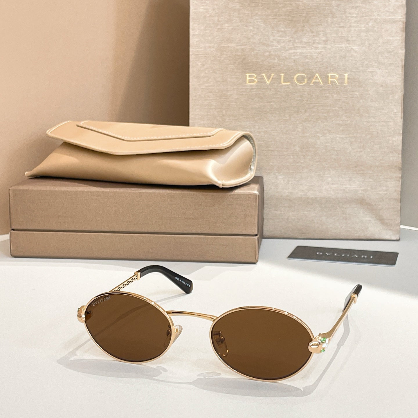 Bvlgari Serpenti Forever Luxury Oval Metal Sunglasses with Gold Frame and Gradient Grey Lenses
