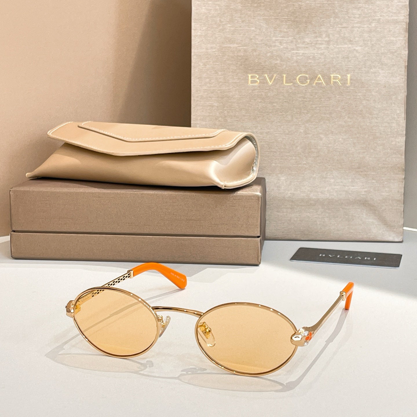 Bvlgari Serpenti Forever Luxury Oval Metal Sunglasses with Gold Frame and Gradient Grey Lenses
