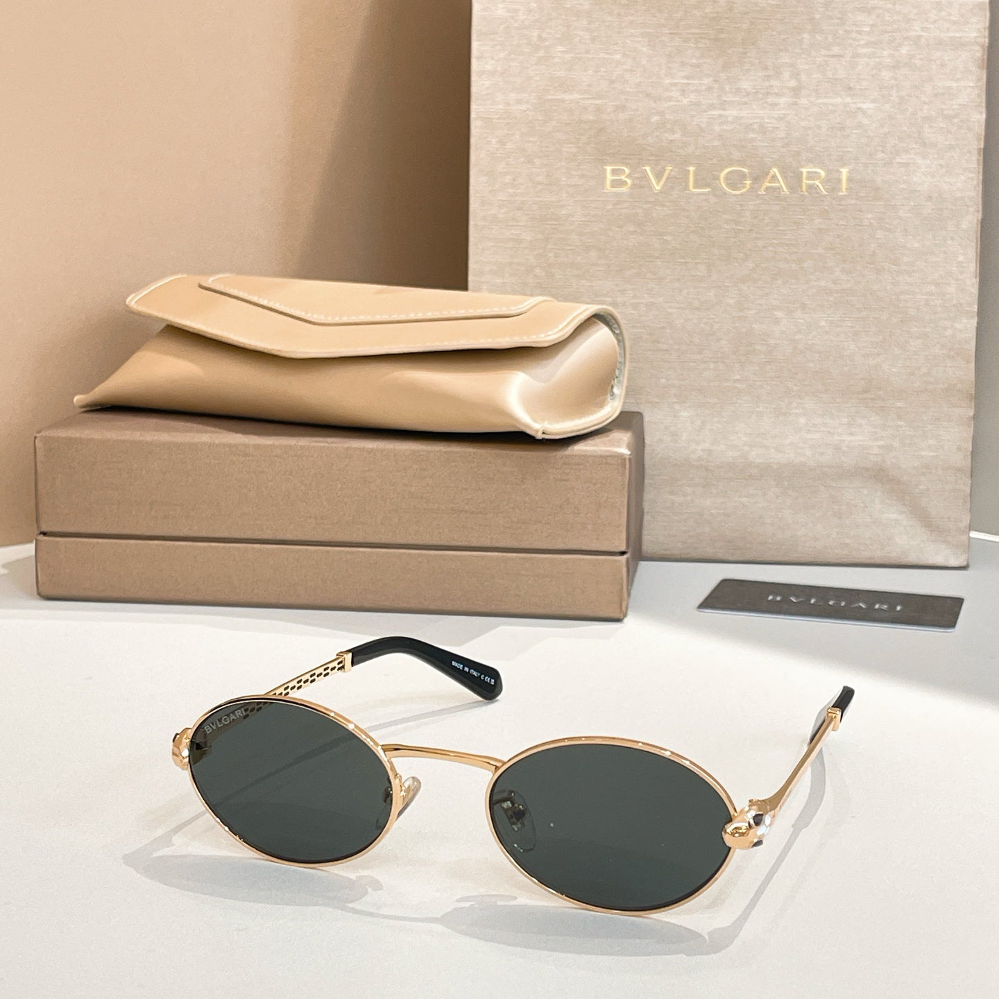 Bvlgari Serpenti Forever Luxury Oval Metal Sunglasses with Gold Frame and Gradient Grey Lenses