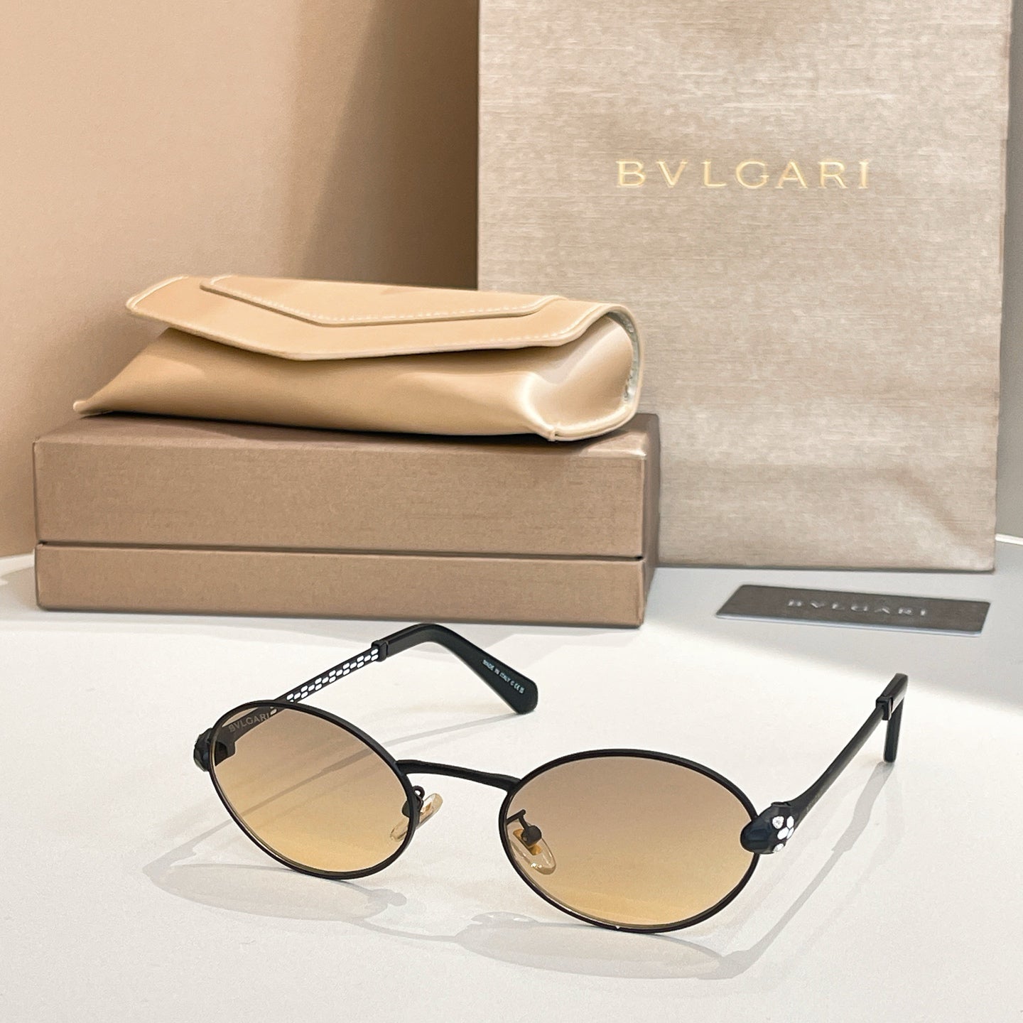 Bvlgari Serpenti Forever Luxury Oval Metal Sunglasses with Gold Frame and Gradient Grey Lenses