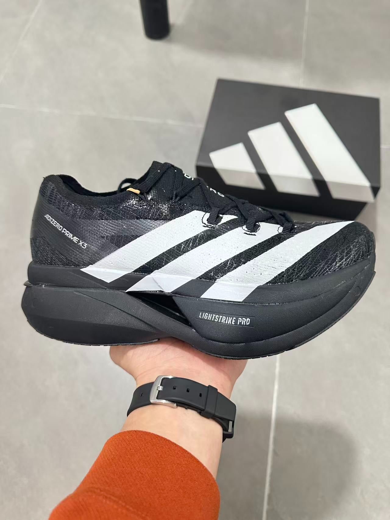 Adidas ADIZERO EVO SL Core Black / Cloud White colorway