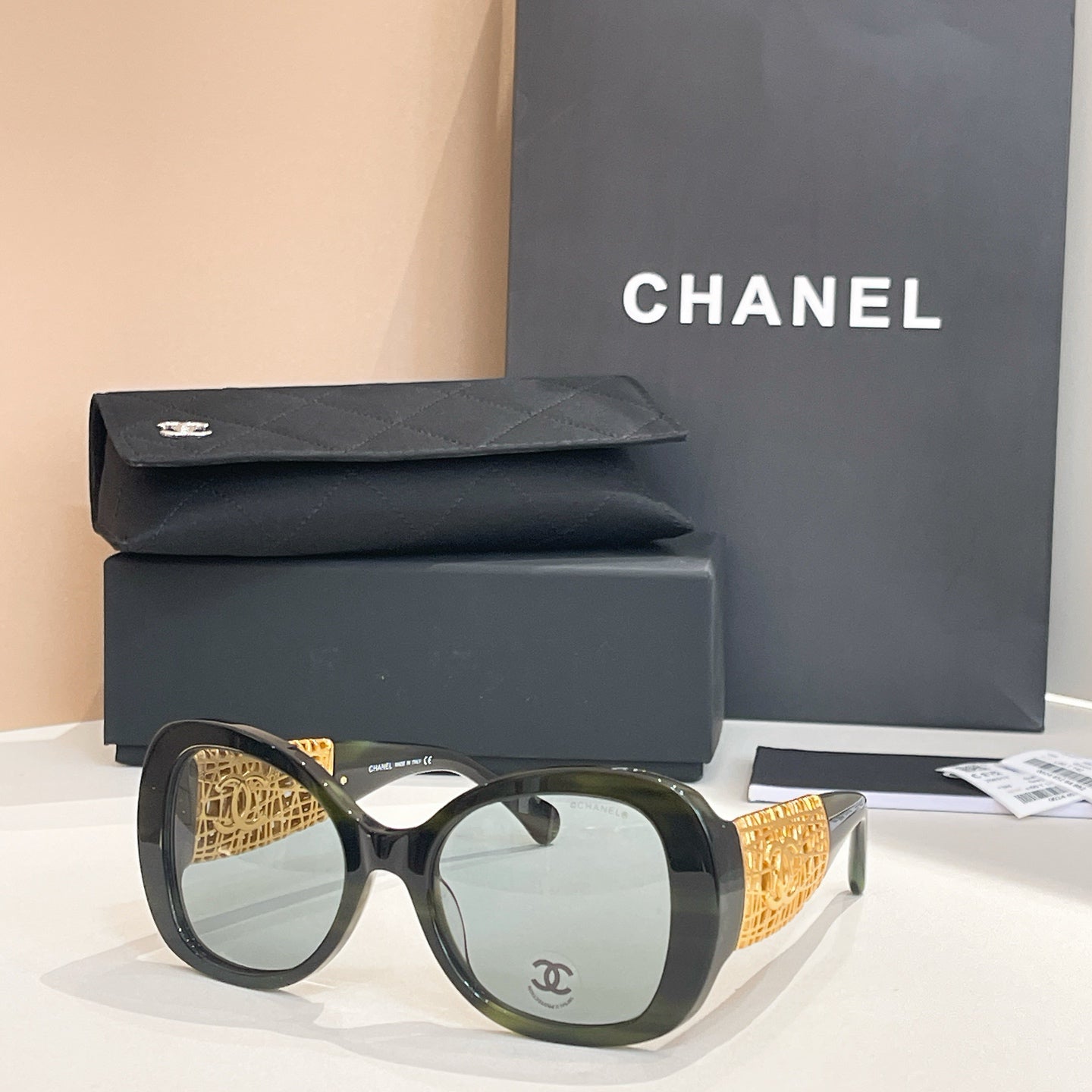 Chanel Black Oversized Sunglasses with Gold-Tone Quilted Temples & Purple Gradient Lenses