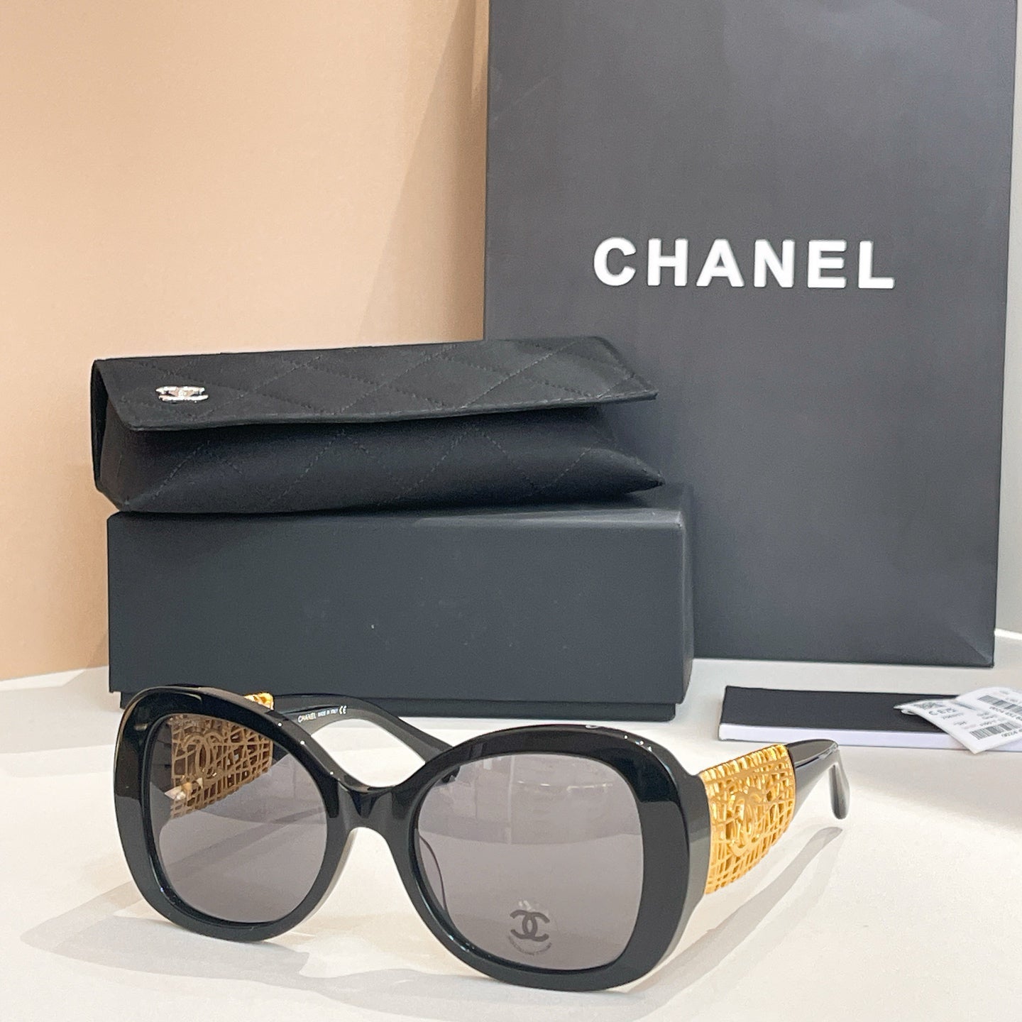 Chanel Black Oversized Sunglasses with Gold-Tone Quilted Temples & Purple Gradient Lenses