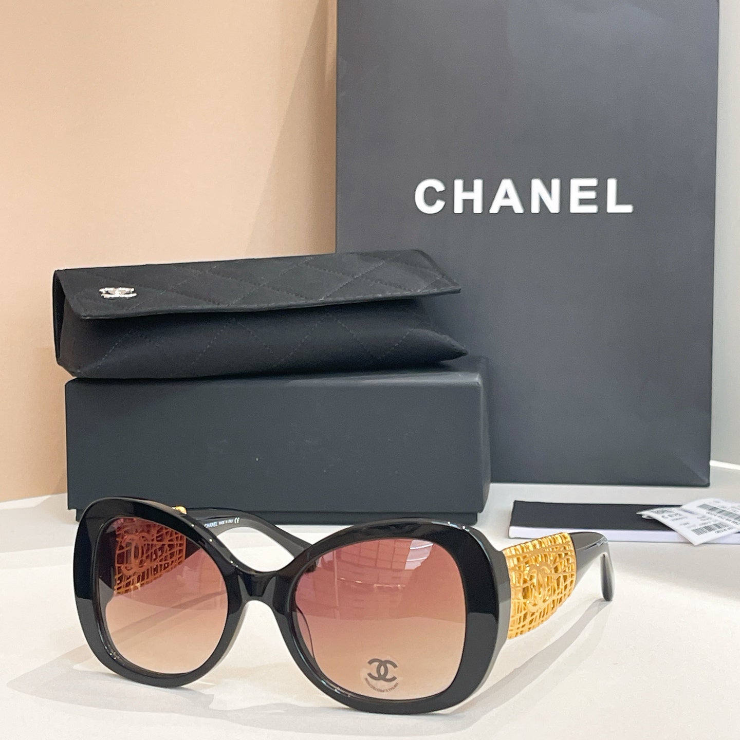 Chanel Black Oversized Sunglasses with Gold-Tone Quilted Temples & Purple Gradient Lenses