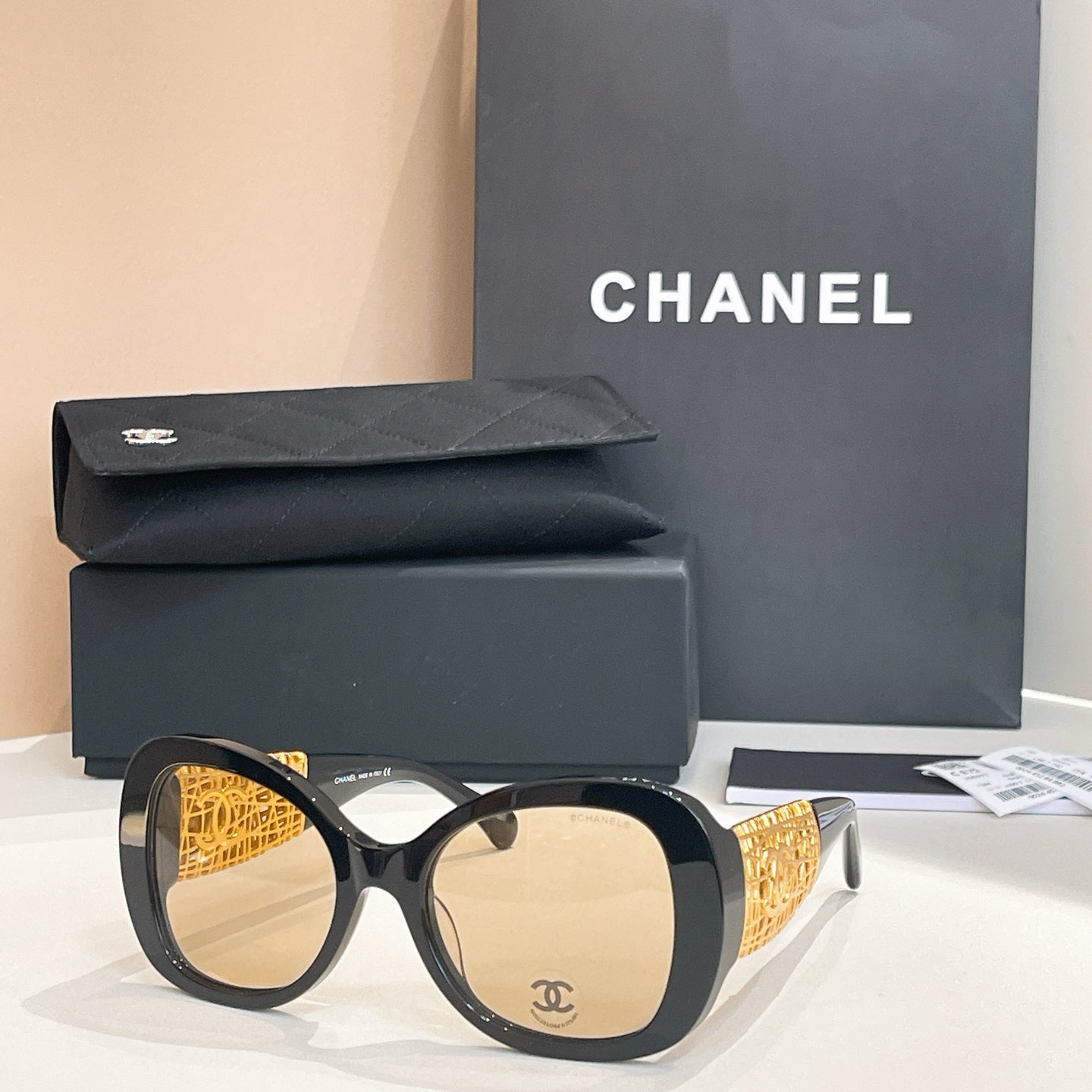 Chanel Black Oversized Sunglasses with Gold-Tone Quilted Temples & Purple Gradient Lenses