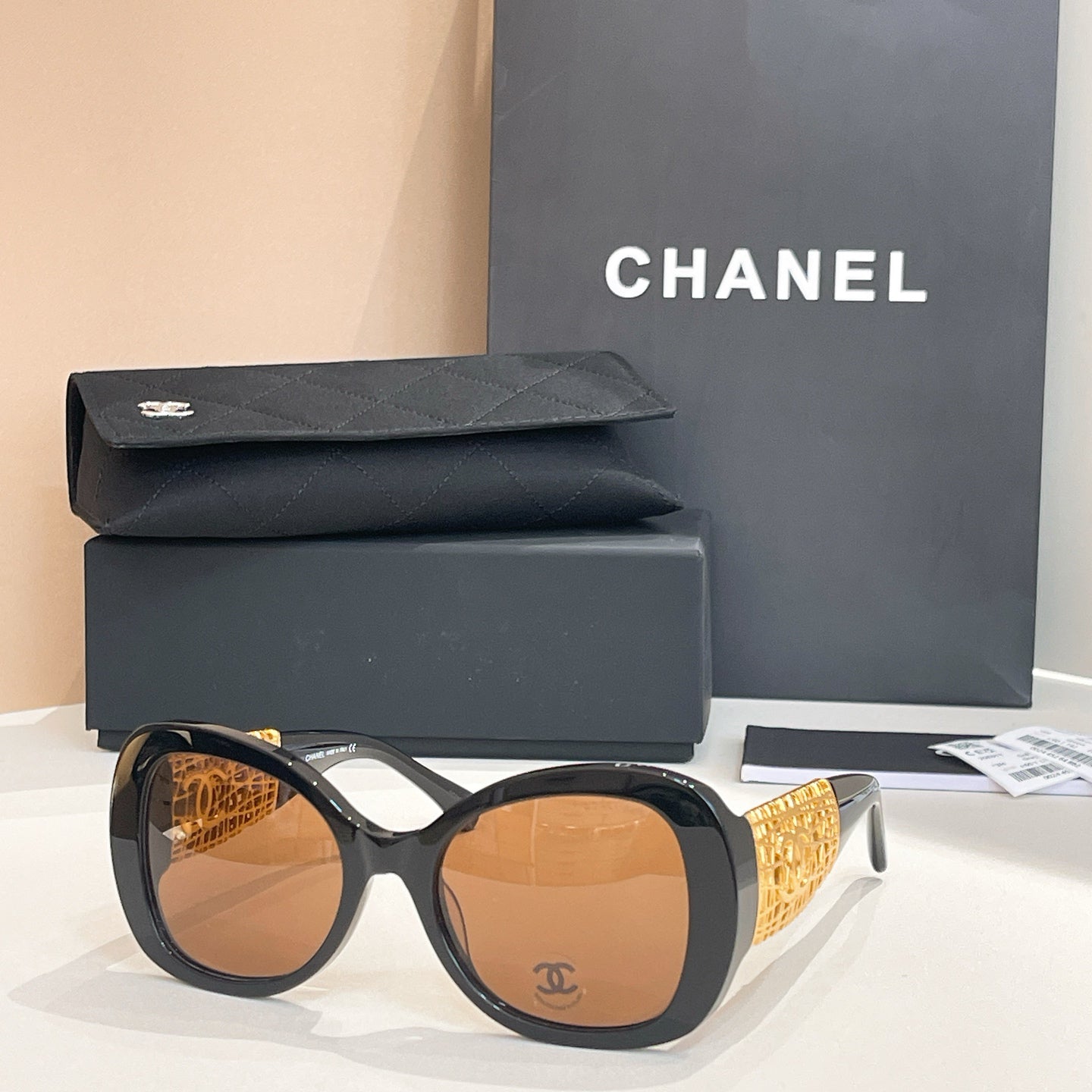 Chanel Black Oversized Sunglasses with Gold-Tone Quilted Temples & Purple Gradient Lenses