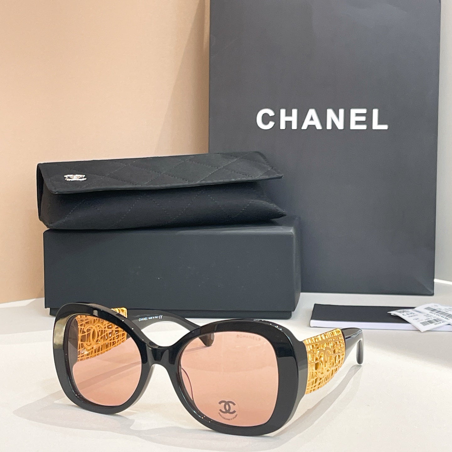 Chanel Black Oversized Sunglasses with Gold-Tone Quilted Temples & Purple Gradient Lenses