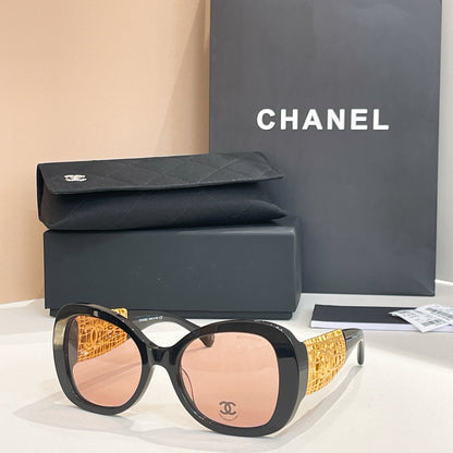 Chanel Black Oversized Sunglasses with Gold-Tone Quilted Temples & Purple Gradient Lenses