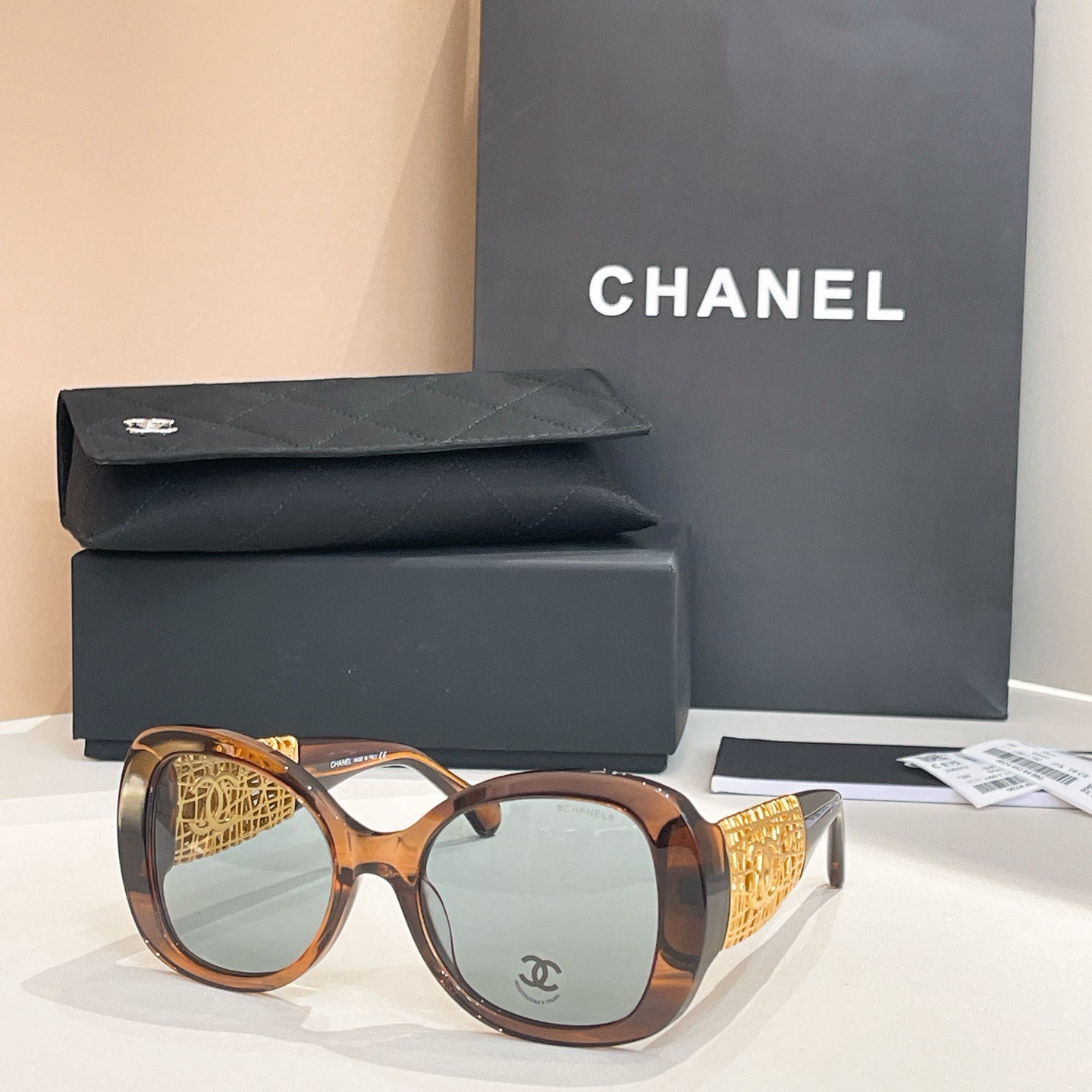 Chanel Black Oversized Sunglasses with Gold-Tone Quilted Temples & Purple Gradient Lenses