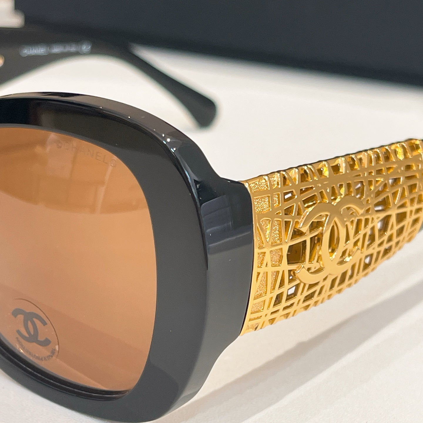 Chanel Black Oversized Sunglasses with Gold-Tone Quilted Temples & Purple Gradient Lenses