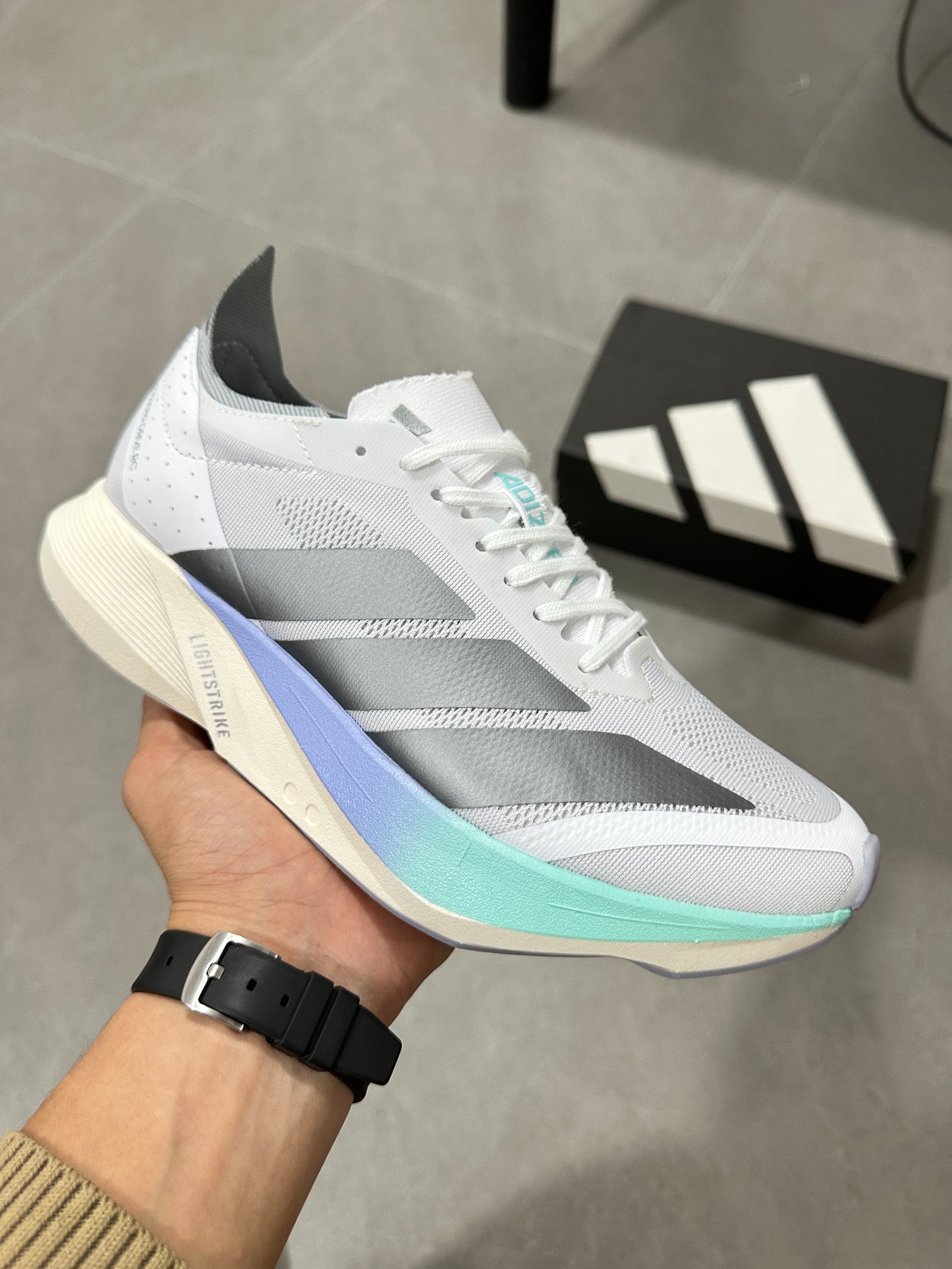 Adidas ADIZERO DRIVE RC (Cloud White / Silver Metallic / Blue Turquoise colorway)