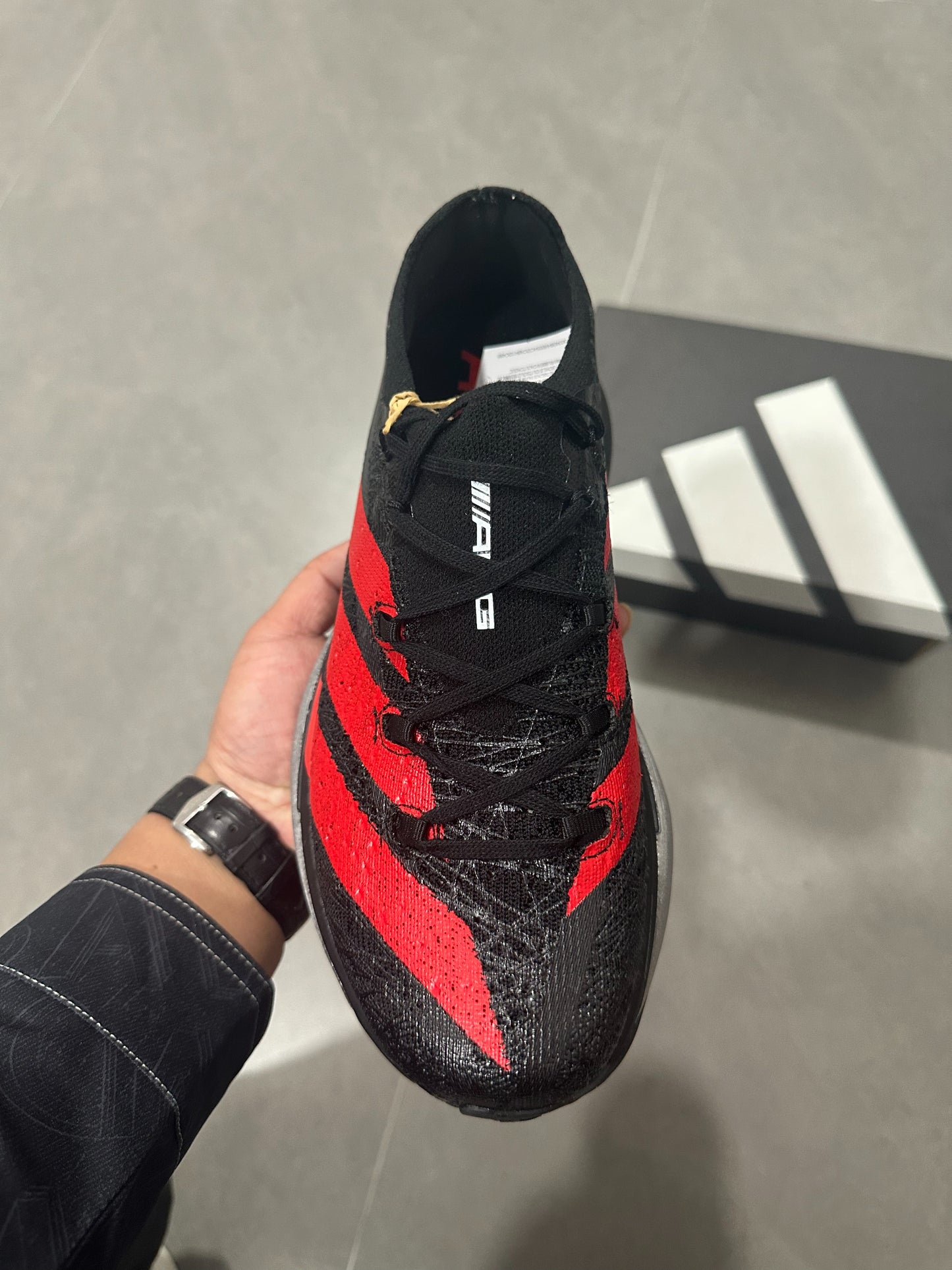 Adidas ADIZERO ADIOS PRO 4 (Core Black / Red / Silver colorway)