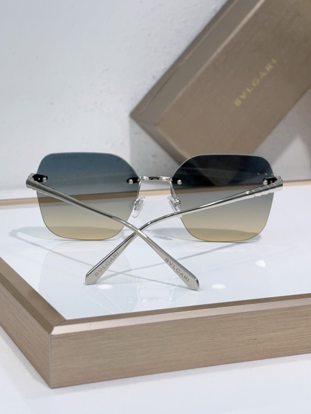 BVLGARI Silver-Tone Rimless Sunglasses with Blue-Yellow Gradient Lenses & Serpenti-Inspired Temples