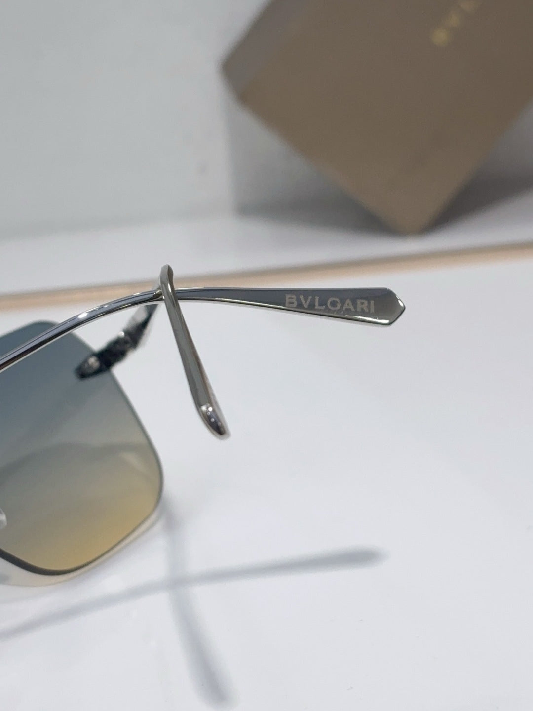 BVLGARI Silver-Tone Rimless Sunglasses with Blue-Yellow Gradient Lenses & Serpenti-Inspired Temples
