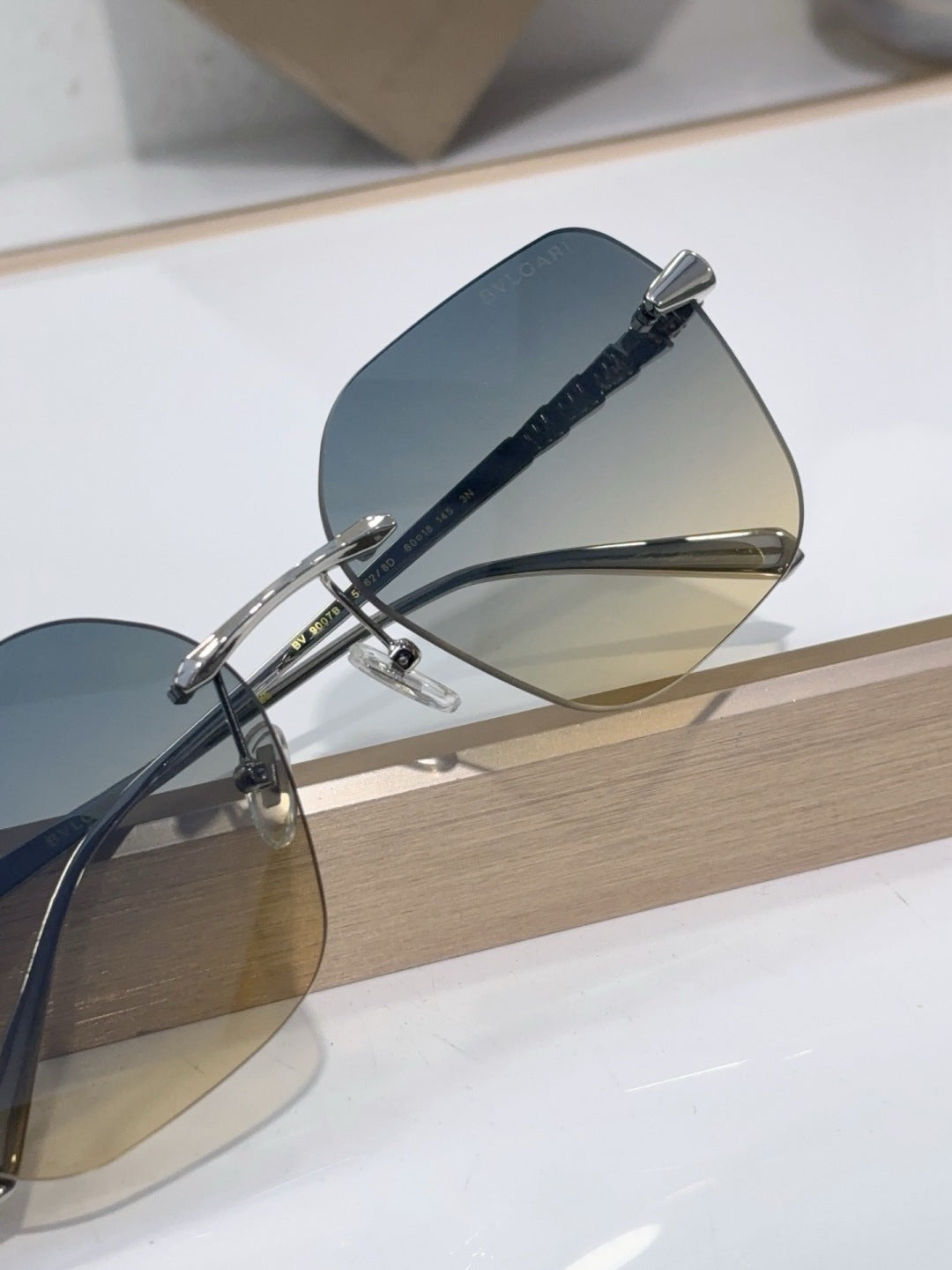 BVLGARI Silver-Tone Rimless Sunglasses with Blue-Yellow Gradient Lenses & Serpenti-Inspired Temples