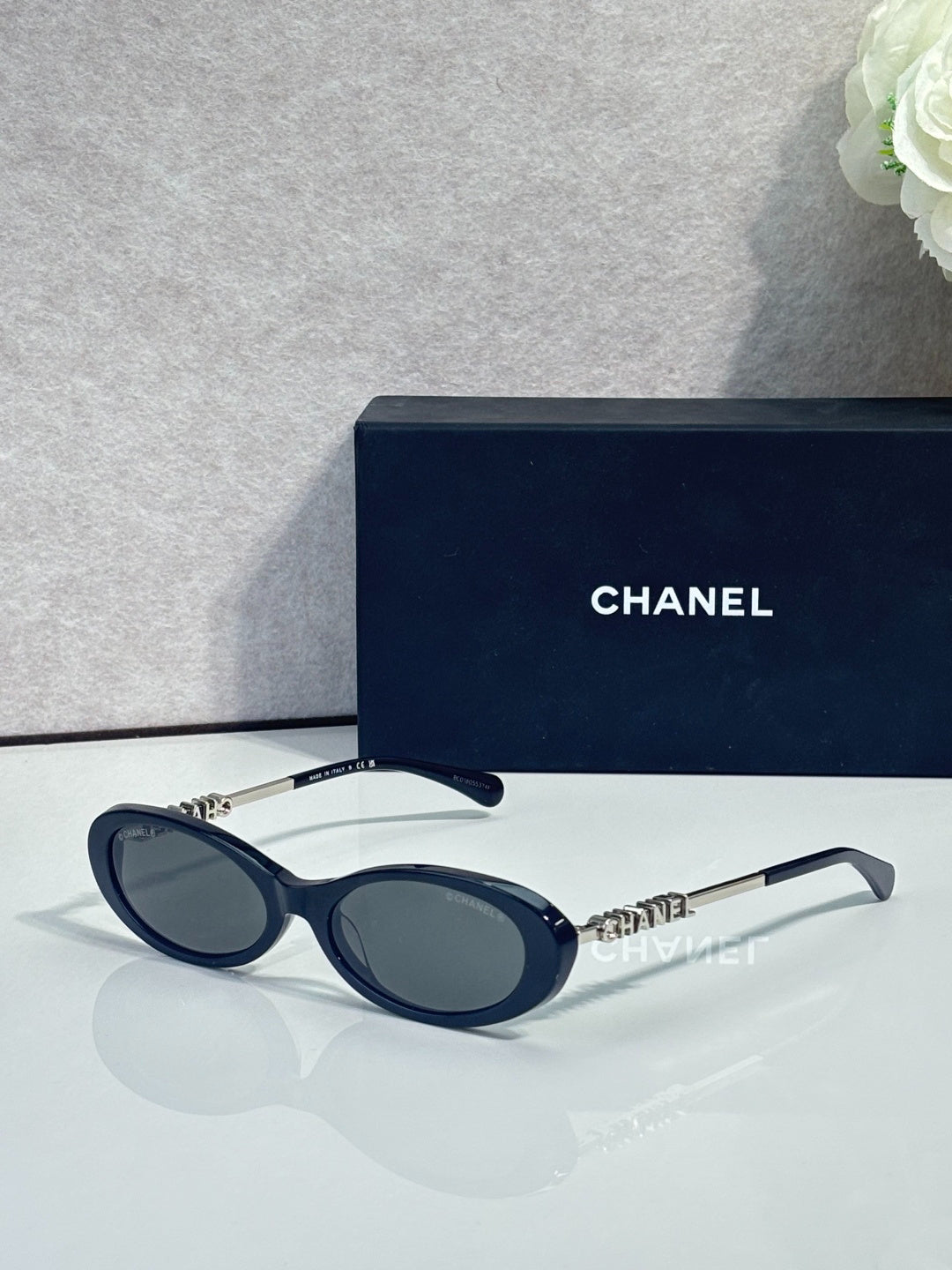 Chanel Transparent Light Gray Oval Sunglasses with Logo Letter Temples