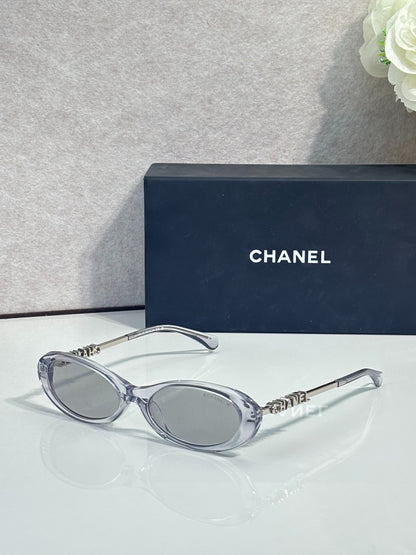 Chanel Transparent Light Gray Oval Sunglasses with Logo Letter Temples