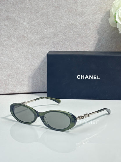 Chanel Transparent Light Gray Oval Sunglasses with Logo Letter Temples