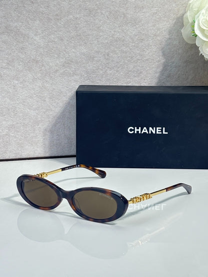 Chanel Transparent Light Gray Oval Sunglasses with Logo Letter Temples