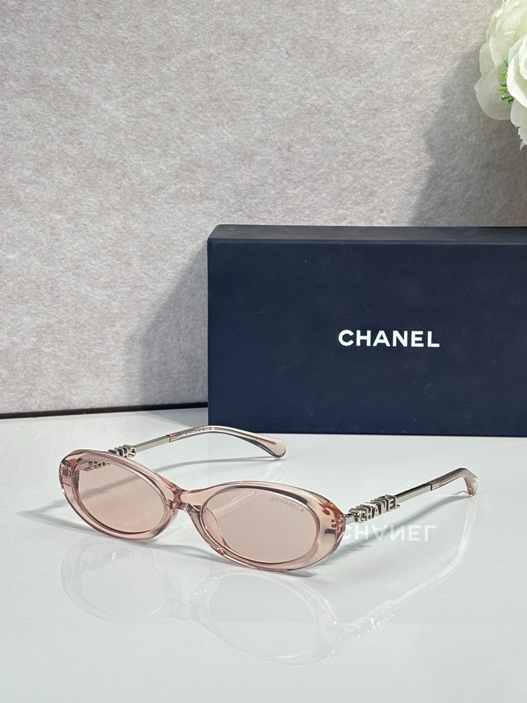 Chanel Transparent Light Gray Oval Sunglasses with Logo Letter Temples