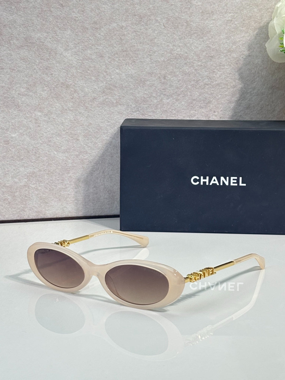 Chanel Transparent Light Gray Oval Sunglasses with Logo Letter Temples