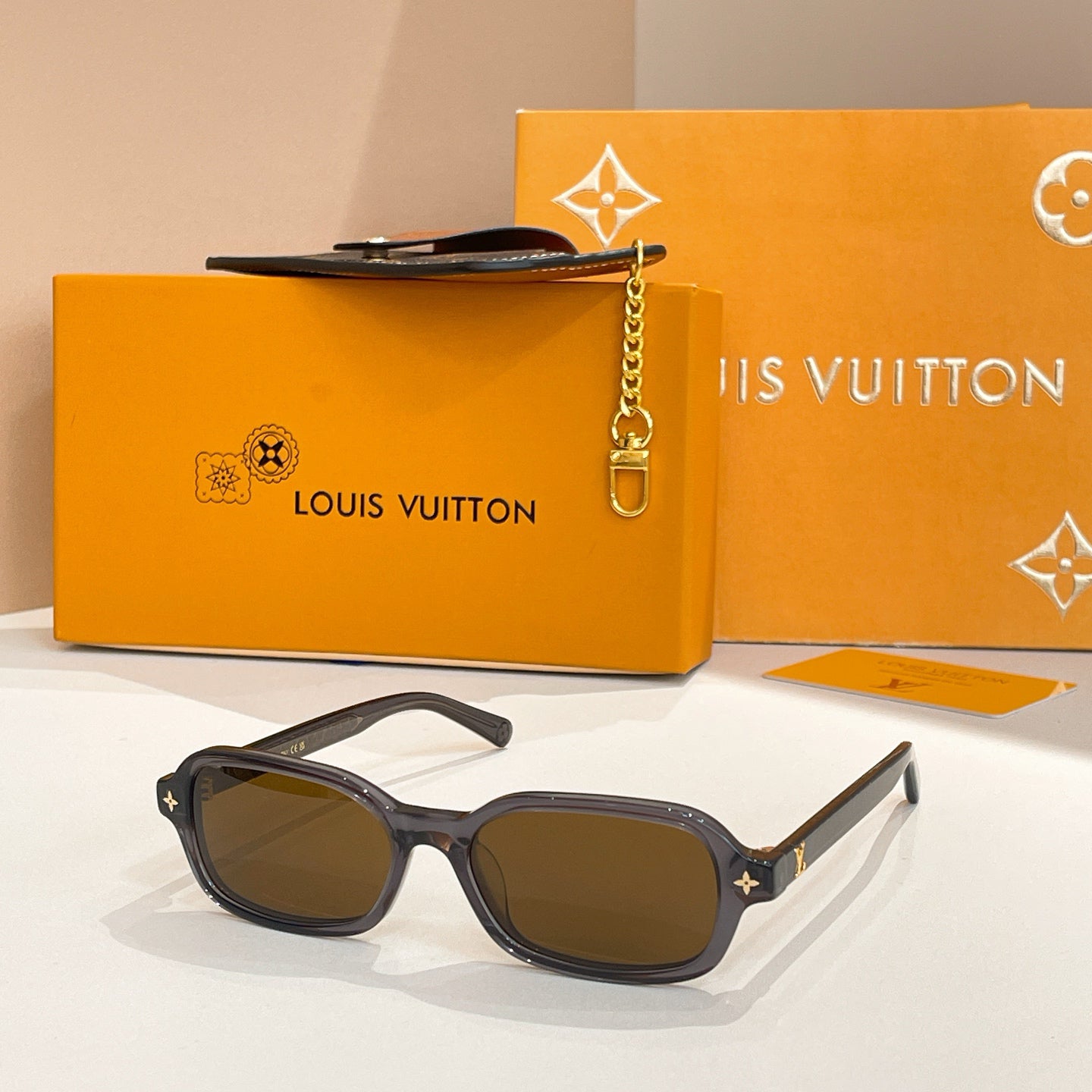 Louis Vuitton Monogram-Embellished Rectangular Sunglasses (Brown Translucent Frame / Light Yellow Lens)