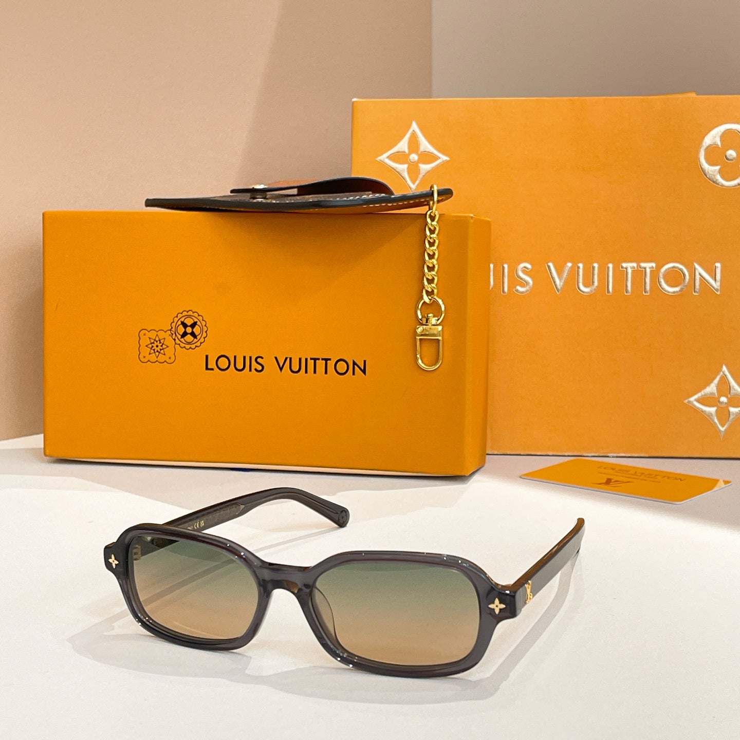 Louis Vuitton Monogram-Embellished Rectangular Sunglasses (Brown Translucent Frame / Light Yellow Lens)