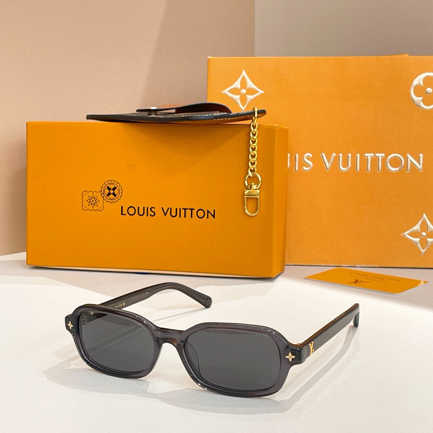 Louis Vuitton Monogram-Embellished Rectangular Sunglasses (Brown Translucent Frame / Light Yellow Lens)